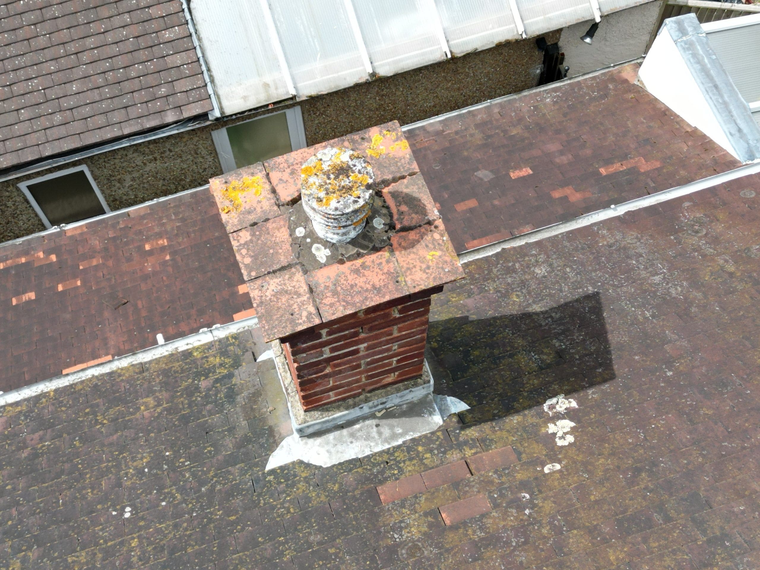 View of a chimney stack and flashing.